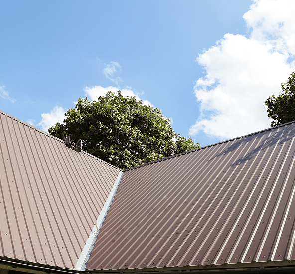 Metal roofing under sunny sky